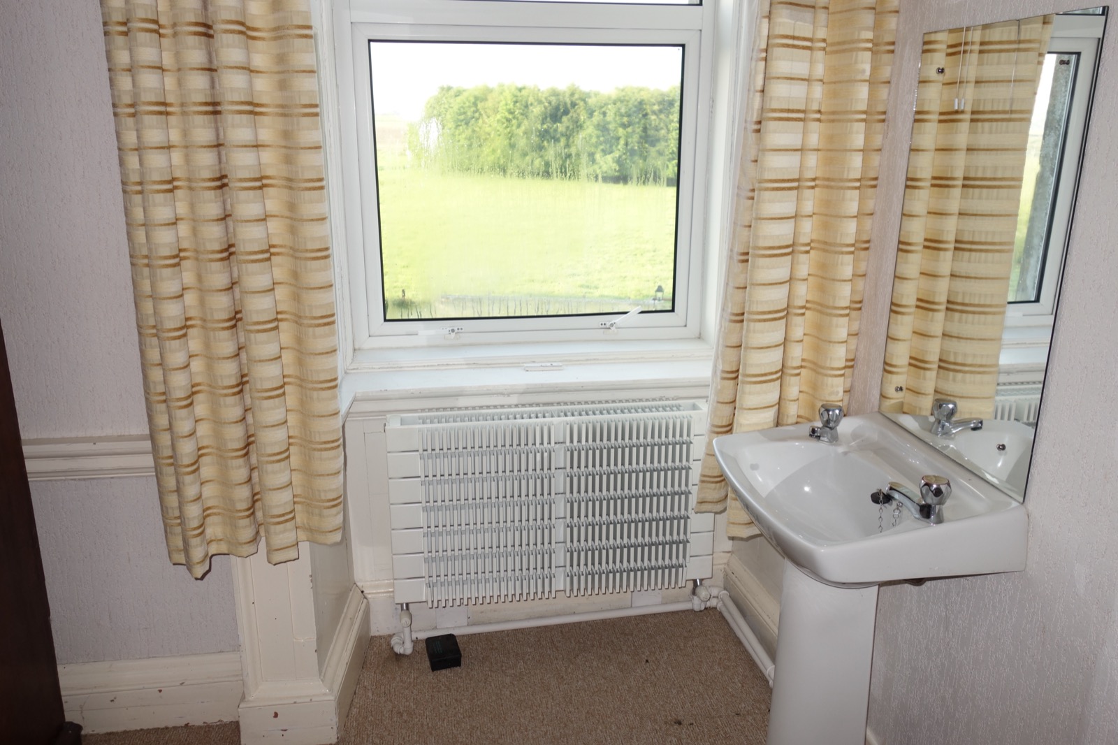 Original bathroom overlooking the pasture